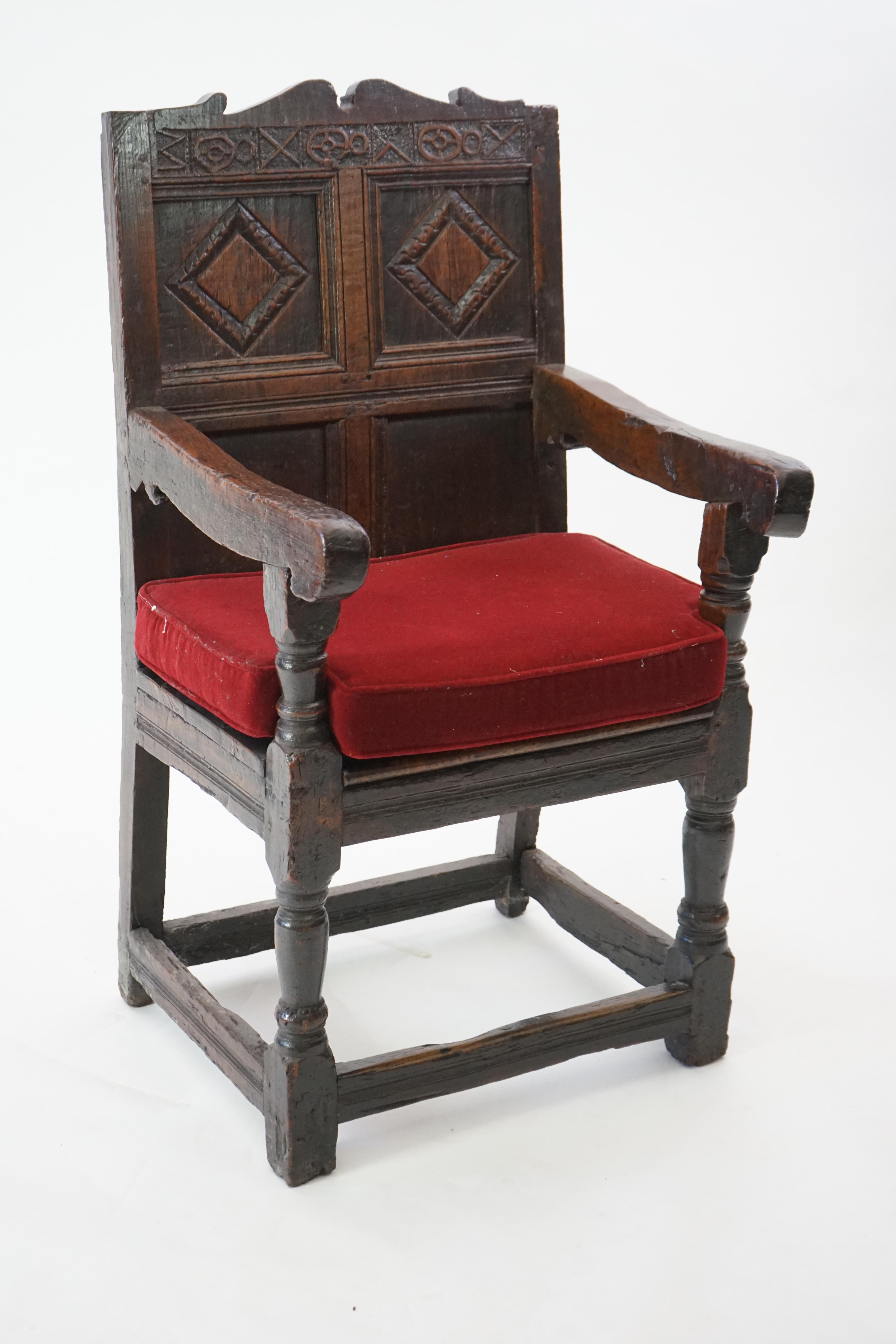 A 17th century and later oak Wainscot elbow chair